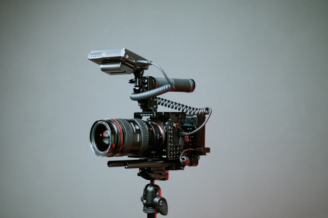 Broadcast camera on pedestal in a television news studio