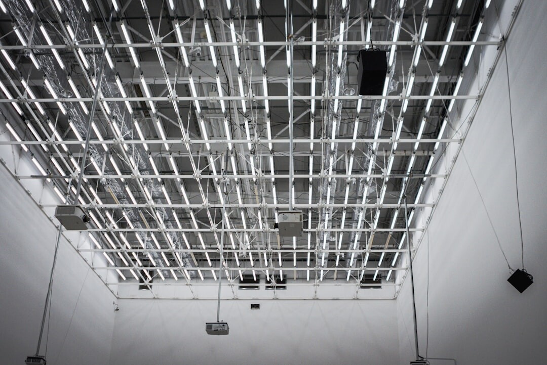 Studio lighting grid with softboxes above a TV set